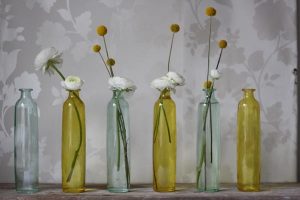 yellow and green glass bottles