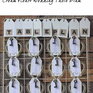 wedding table plan cream heart with vintage keys and luggage tags copy