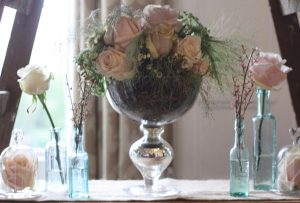 footed vases low wedding flowers muted roses