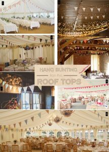 hanging wedding bunting from the roof of marquee or barn