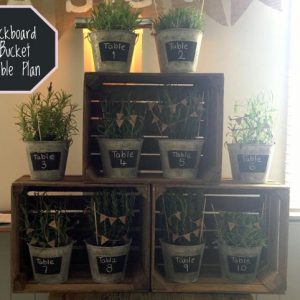 wedding table plan blackboard buckets and crates