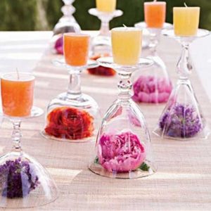diy wedding centrepiece wine glasses candles flower heads