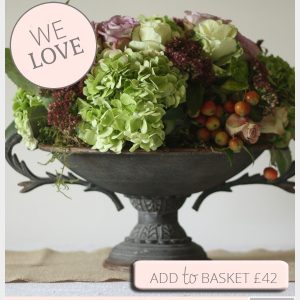 rustic urn wedding centrepiece