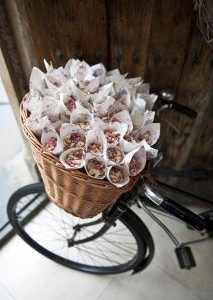 paper confetti cones in a bicycle basket