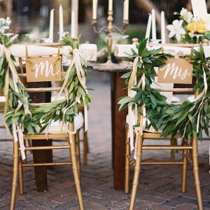 chair back ideas for summer weddings foliage garland with mr and mrs signs