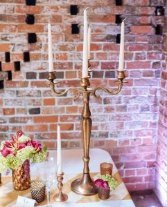 metallic-wedding-candelabra-centrepieces-by-@theweddingomd-metallic-wedding-ideas.