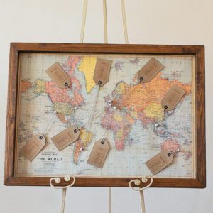 world map summer wedding table plan available from @theweddingomd