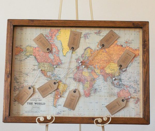 world map summer wedding table plan available from @theweddingomd