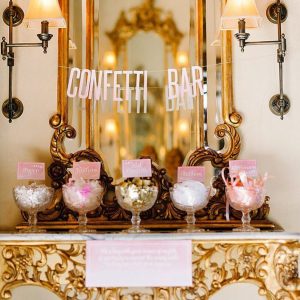 Create A Wedding Confetti Bar For Your Guests  Ruffled - photo by http://debbielourensphotography.com/ - http://ruffledblog.com/smitten-with-sparkle-wedding-inspiration