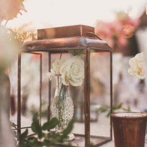 Brass lantern wedding centrepiece