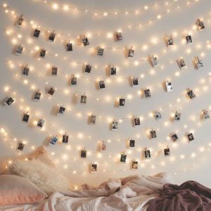 Wedding photo displays LED lights pegs and polaroid cameras