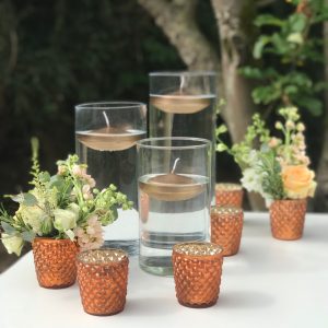 copper wedding centrepieces cylinder vases floating candles