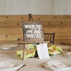 Kids table wedding centrepiece ideas sign where the cool kids hang out