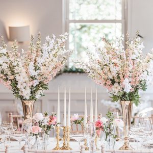 Gold wedding centrpieces gold candlesticks wedding ideas