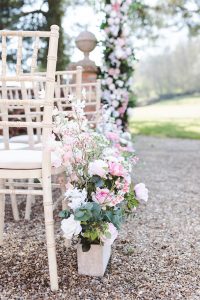 country garden wedding ceremony aisle flowers