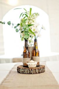 brown amber bottles wedding centrepieces
