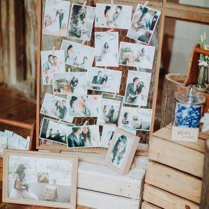 wedding photos displayed on wire mesh boards